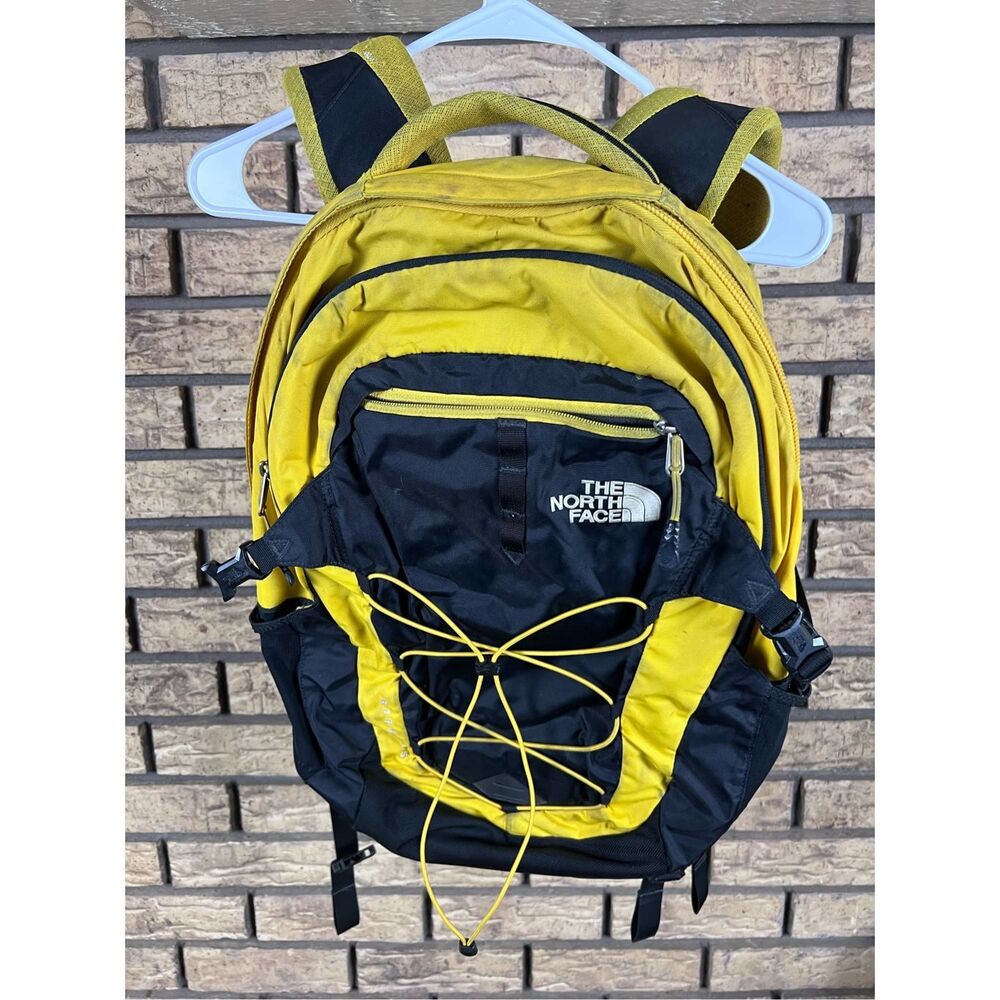 The North Face Borealis Backpack Yellow Black Laptop Sleeve